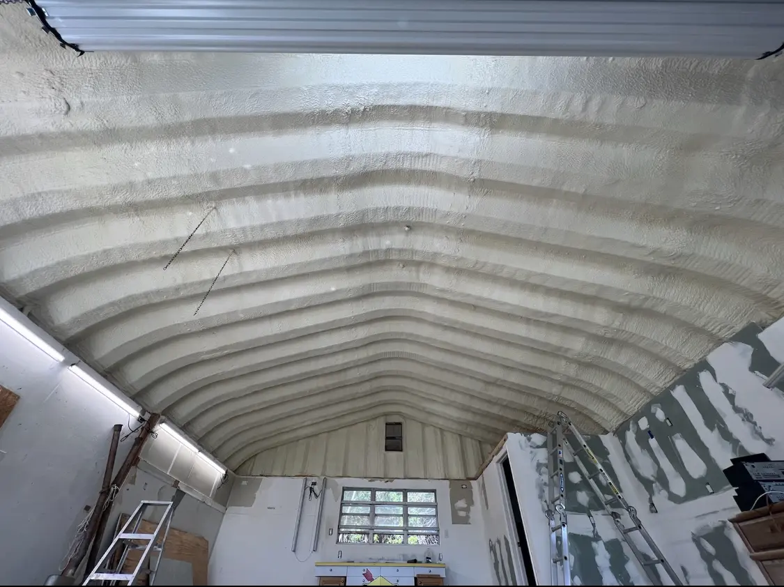 Spray polyurethane foam applied to the underside of a metal roof deck in Yazoo City